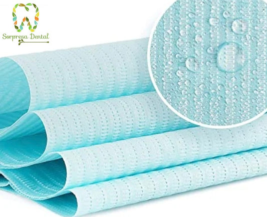 Baberos Dentales Desechables con diseño de dientes (50 Unidades)